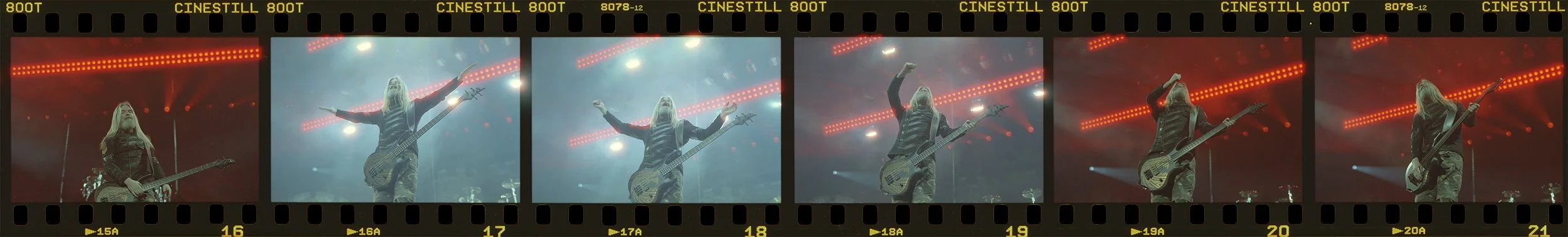 Series of six vintage film strip frames showing a female musician performing on stage with a bass guitar, with red stage lights and foggy background.